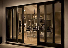 black interior doors sliding to dining room 