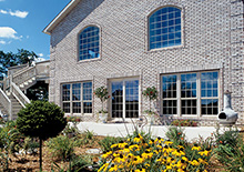 Exterior side view of home's windows 